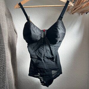 Vintage 1960s corset bra - black with a red rose detail